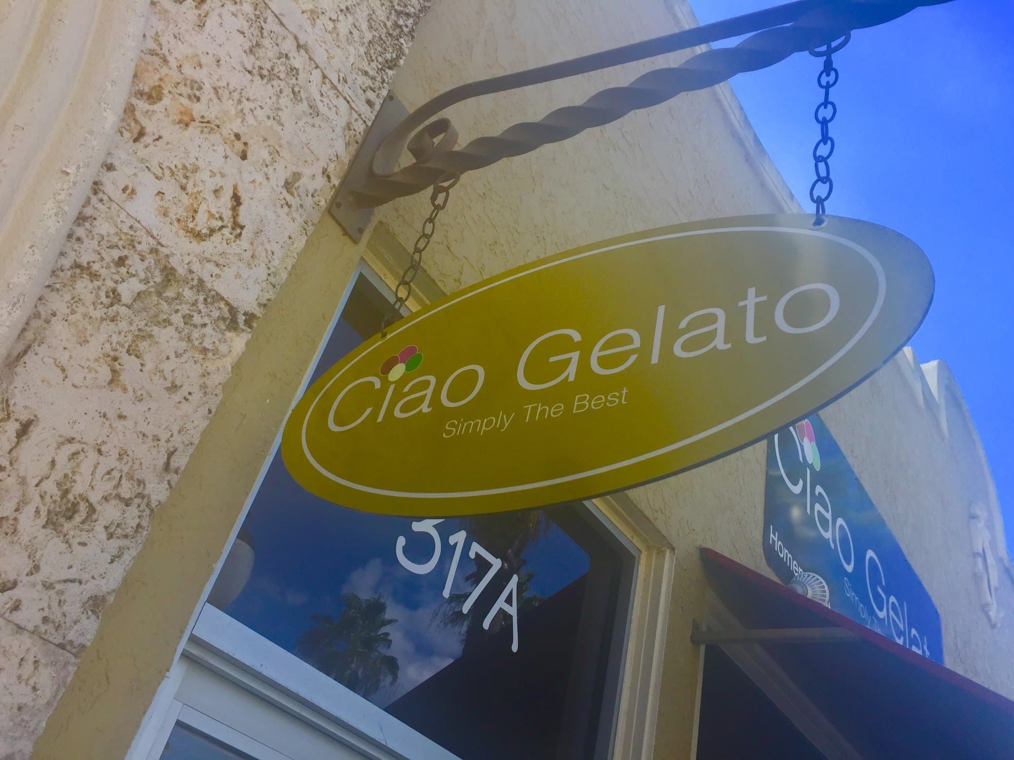 Ciao Gelato's hand-painted sign hanging outside the shop
