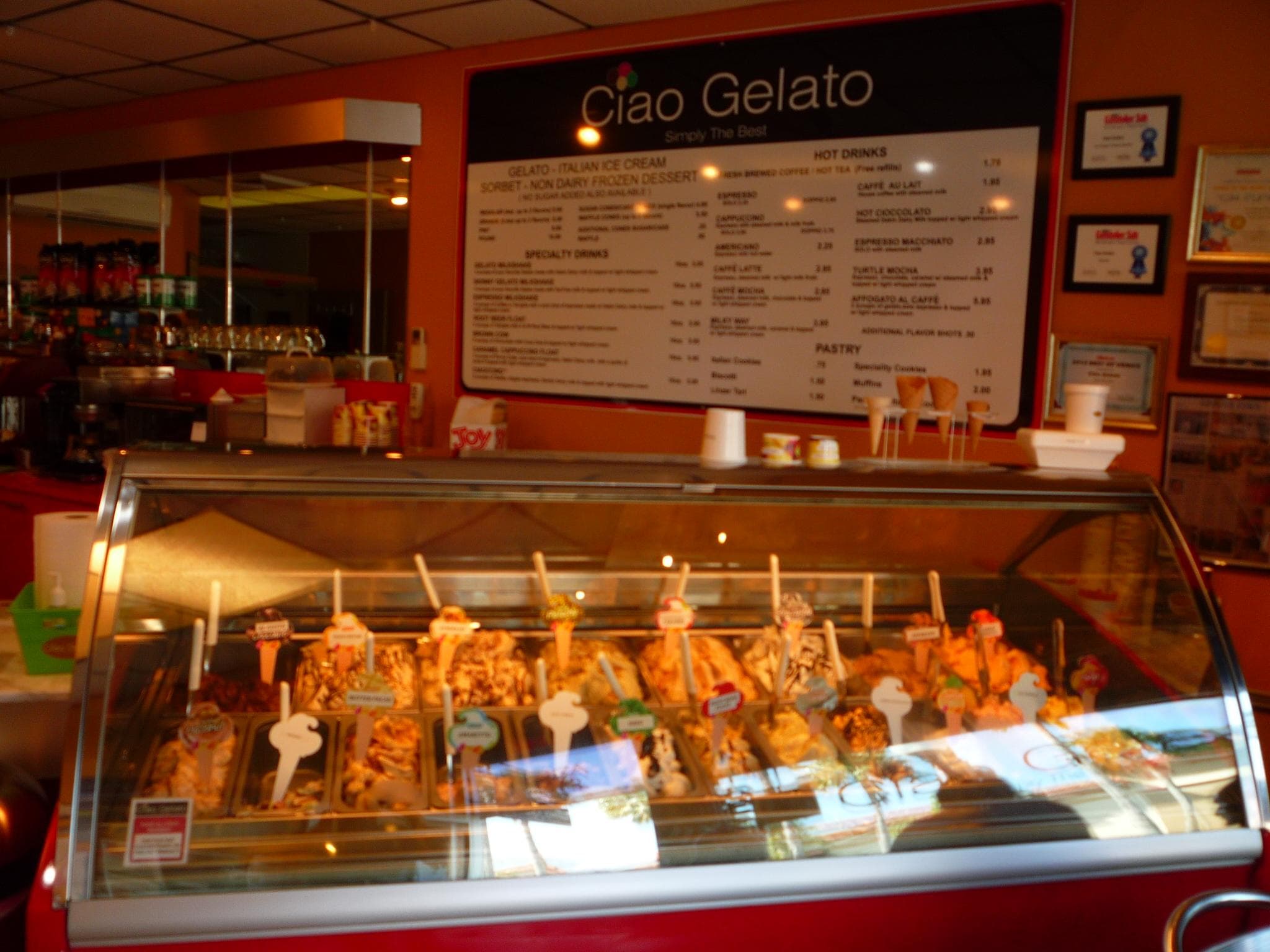 The gelato case and menu board inside Ciao Gelato